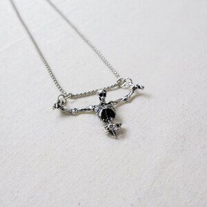y2k style silver skeleton prisoner pendant necklace
